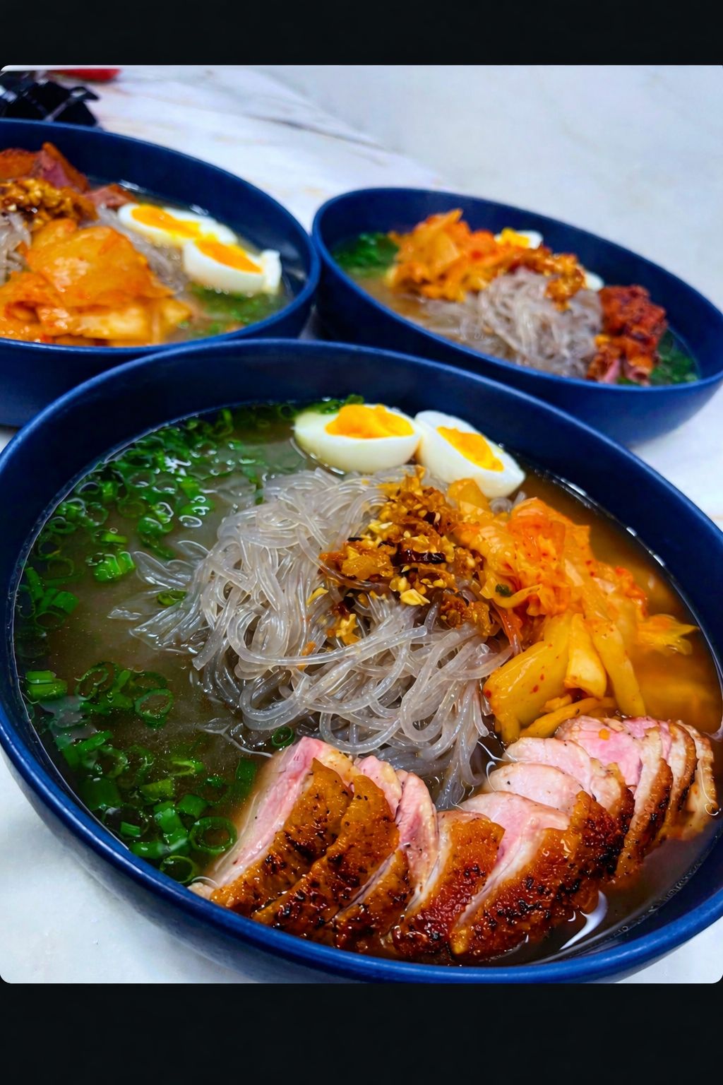 Duck ramen with glass noodles, egg & kimchi