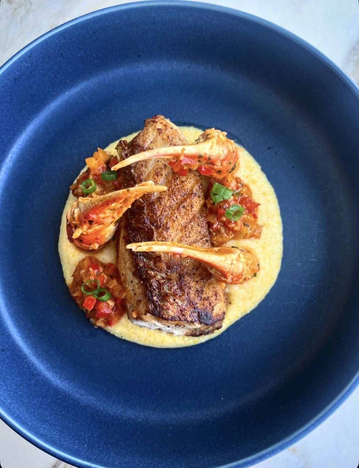 Seared red snapper with creamy polenta & snow crab claws