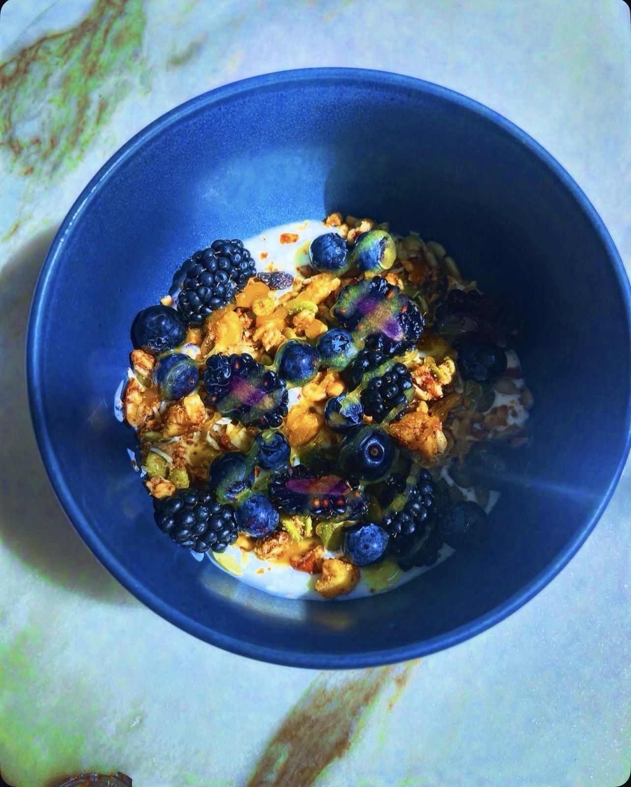 Yogurt bowl with blueberries, blackberries & granola